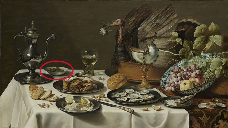 Een stilleven van Pieter Claeszn. uit circa 1625. Met de aanwezigheid van een schaaltje olijven werd de rijkdom extra benadrukt