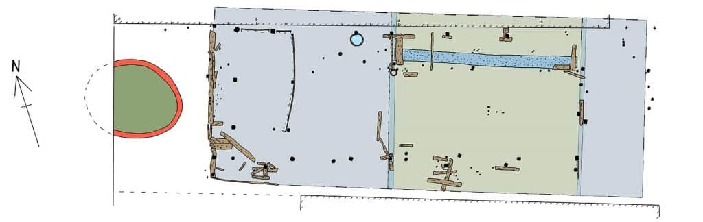 Een tekening van een klein boerderijtje rond 1350 gebouwd. Met aan de westkant een woonvertrek en een middenruimte en aan de oostkant een veestal. Deze boerderij werd opgegraven bij Achterdam 26 in 1995. Hij had ingeheide staanders en planken wanden. Met een leemvloer in het woondeel en middendeel (grijs in de tekening). De stal (groen) was ongeveer 40 cm verdiept voor de opvang van de mest. Met een soort loopdammetje van kleizoden langs de noordkant. Achter de boerderij bevond zich een bakstenen beerput. Tekening Peter Bitter.