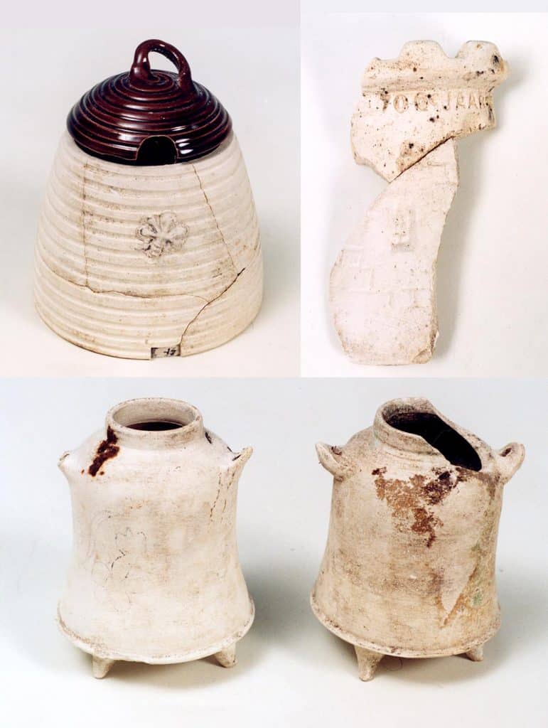 Een honingpotje met deksel, een Alkmaars burchtje en twee miniatuur dovertjes - door Jan Kalksma.